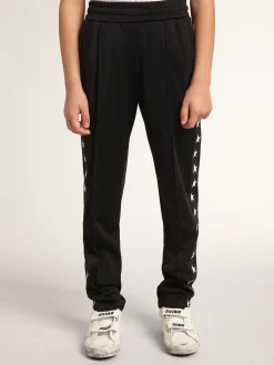 Clearance Calça de jogging preta com estrelas brancas em contraste Bottoms (4-12 years)|Bottoms (4-12 years)