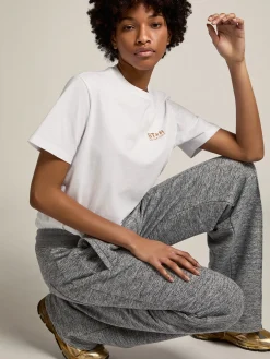 Flash Sale Camiseta feminina branca com logo e estrela de glitter dourado MULHER Camisetas