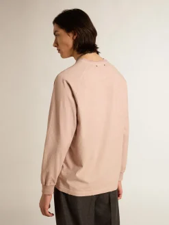 New Camiseta rosa pó com escrita branca na frente Camisetas