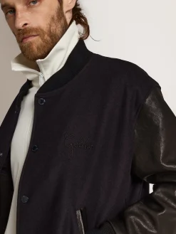 Shop Jaqueta bomber masculina de lã azul-escura e mangas de couro Casacos e blusões