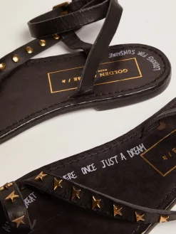 Outlet Sandália rasteira Feminina de couro preto com estrelas douradas MULHER Sapatos